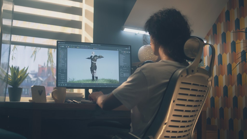 Persona modelando un personaje en 3d y programando para un videojuego. 